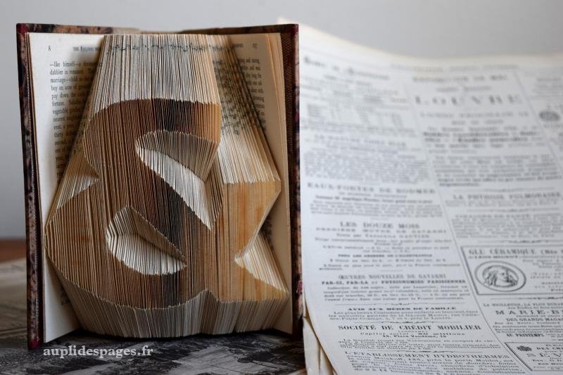 le typographe, sculpture de livre plié